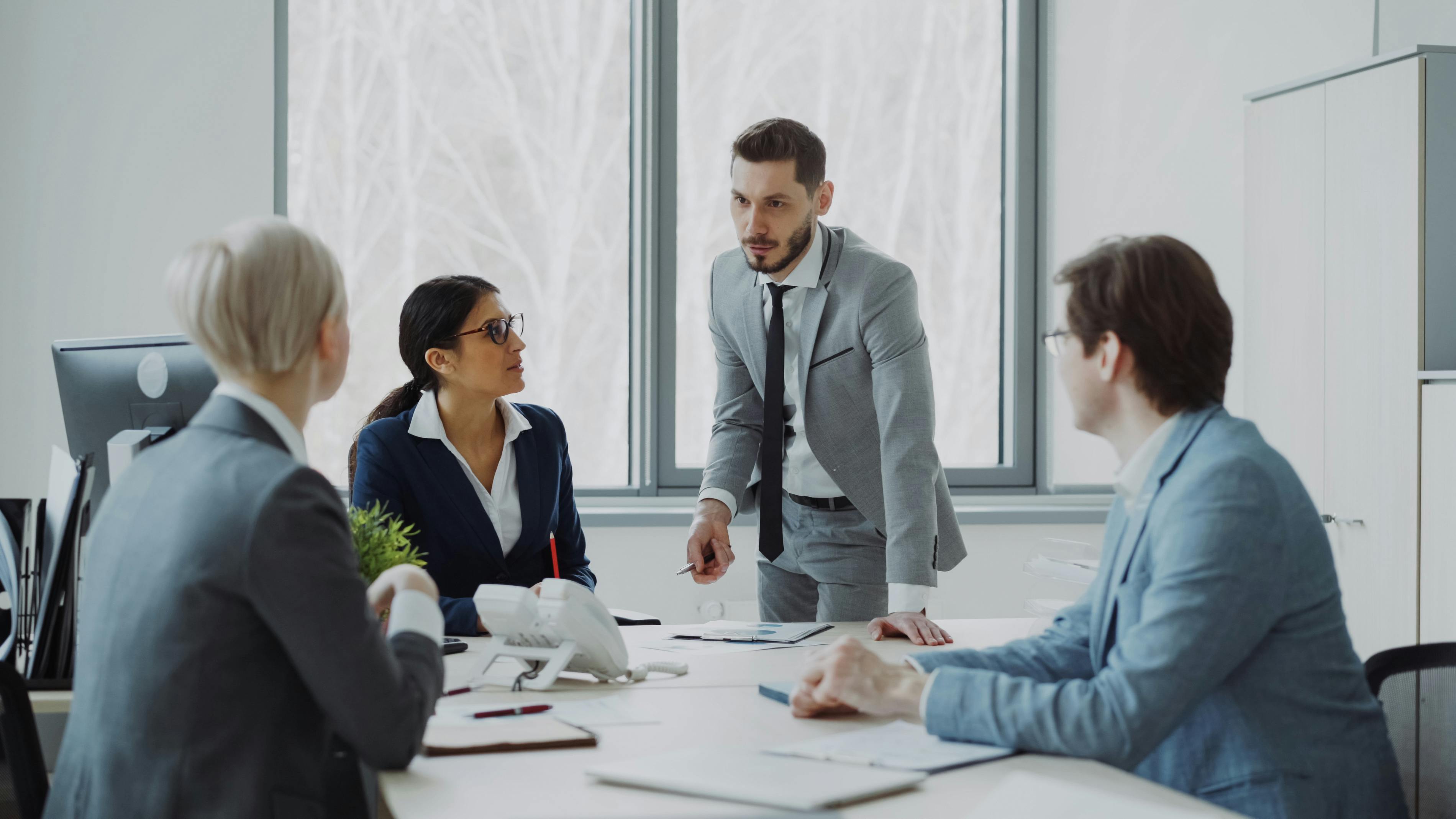 A team collaborating around policy work