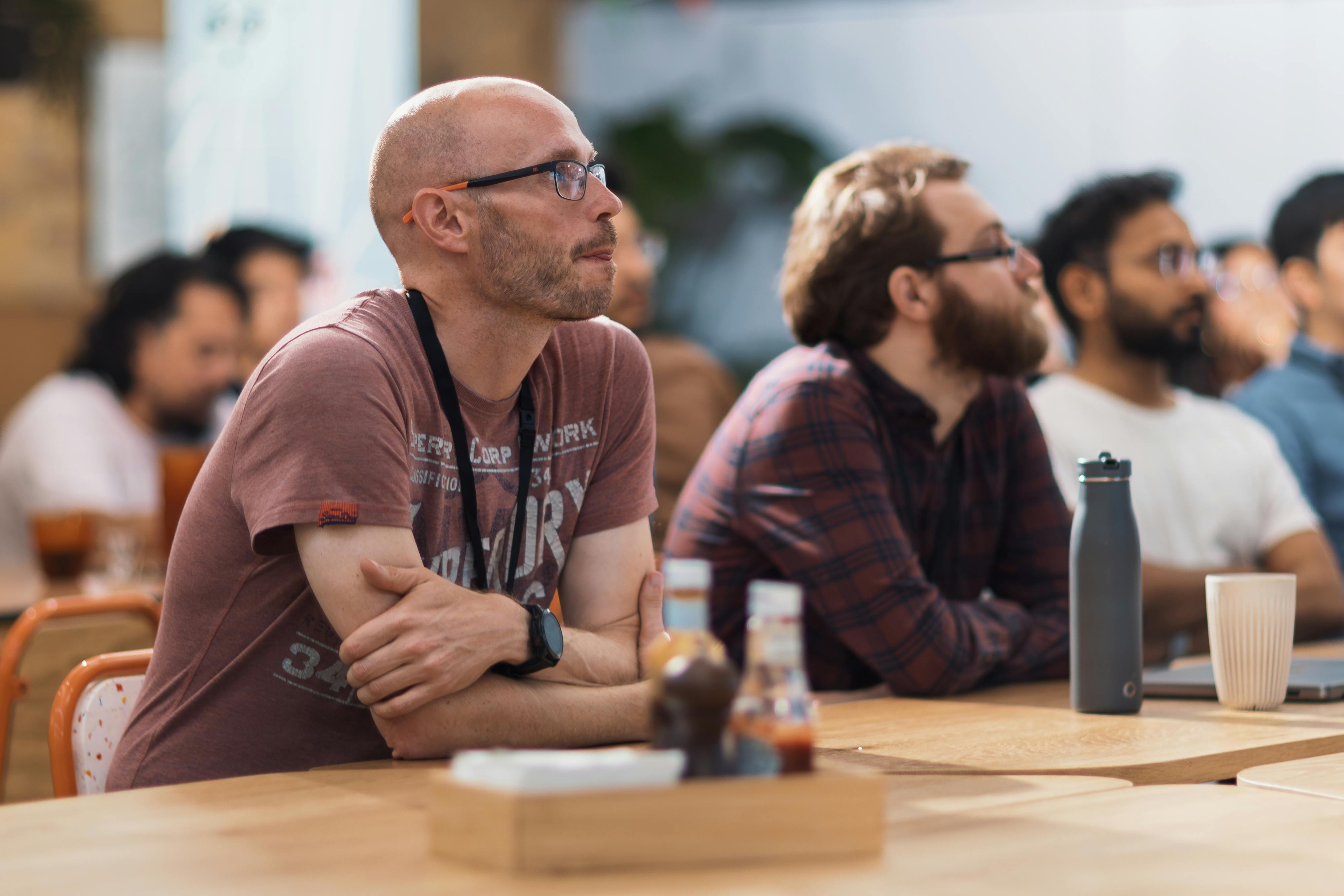 Summit attendees listening during a policy conference